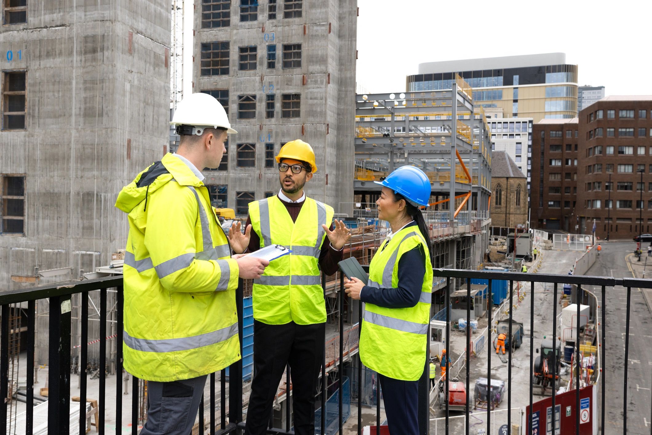 Pressure Clean team members planning exterior service work